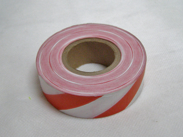 red & white stripe surveyors tape