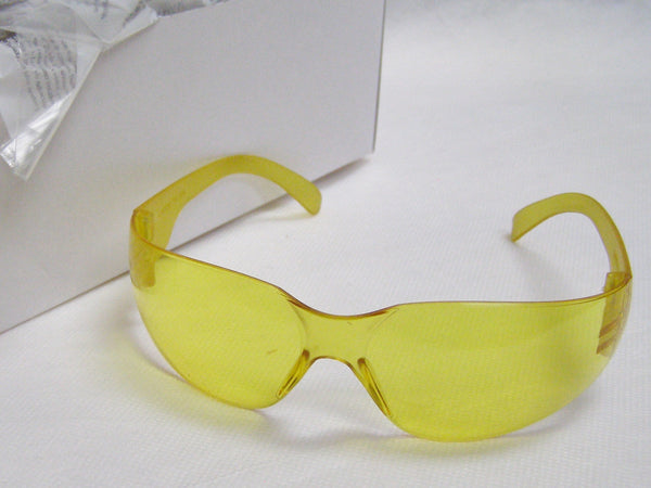 box of amber safety glasses